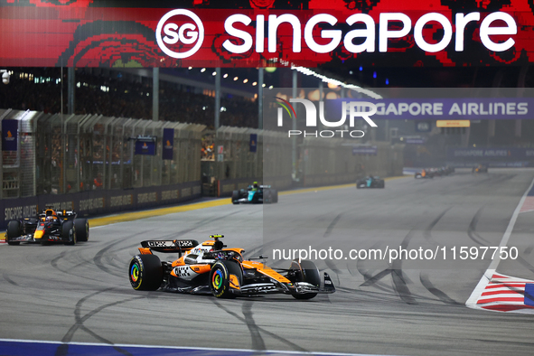 Lando Norris of the United Kingdom drives the McLaren Formula 1 Team MCL38 during the F1 Grand Prix of Singapore at Marina Bay Street Circui...