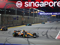 Lando Norris of the United Kingdom drives the McLaren Formula 1 Team MCL38 during the F1 Grand Prix of Singapore at Marina Bay Street Circui...