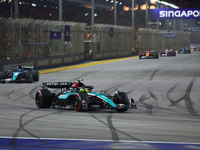 Lewis Hamilton of the United Kingdom drives the Mercedes-AMG Petronas F1 Team F1 W15 during the F1 Grand Prix of Singapore at Marina Bay Str...