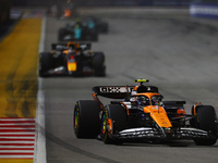 Lando Norris of the United Kingdom drives the McLaren Formula 1 Team MCL38 during the F1 Grand Prix of Singapore at Marina Bay Street Circui...