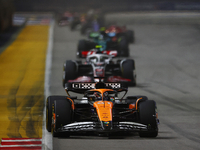 Oscar Piastri of Australia drives the McLaren Formula 1 Team MCL39 during the F1 Grand Prix of Singapore at Marina Bay Street Circuit in Sin...