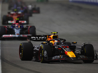 Sergio Perez of Mexico drives the Red Bull Racing-Honda RBPT RB20 during the F1 Grand Prix of Singapore at Marina Bay Street Circuit in Sing...