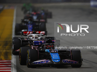 Esteban Ocon of France drives the BWT Alpine F1 Team A524 during the F1 Grand Prix of Singapore at Marina Bay Street Circuit in Singapore, S...