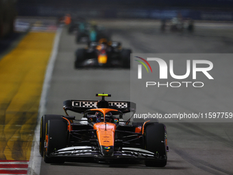 Lando Norris of the United Kingdom drives the McLaren Formula 1 Team MCL38 during the F1 Grand Prix of Singapore at Marina Bay Street Circui...