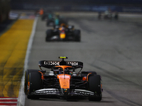 Lando Norris of the United Kingdom drives the McLaren Formula 1 Team MCL38 during the F1 Grand Prix of Singapore at Marina Bay Street Circui...