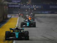 Lewis Hamilton of the United Kingdom drives the Mercedes-AMG Petronas F1 Team F1 W15 during the F1 Grand Prix of Singapore at Marina Bay Str...