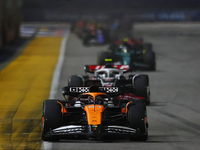 Oscar Piastri of Australia drives the McLaren Formula 1 Team MCL39 during the F1 Grand Prix of Singapore at Marina Bay Street Circuit in Sin...