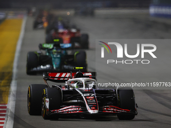 Nico Hulkenberg of Germany drives the MoneyGram Haas F1 Team VF-24 during the F1 Grand Prix of Singapore at Marina Bay Street Circuit in Sin...