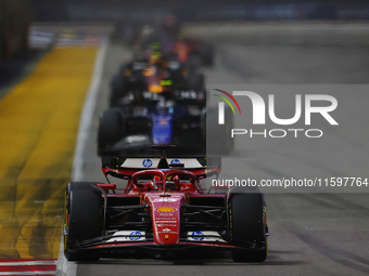 Charles Leclerc of Monaco drives the Scuderia Ferrari SF-24 during the F1 Grand Prix of Singapore at Marina Bay Street Circuit in Singapore,...