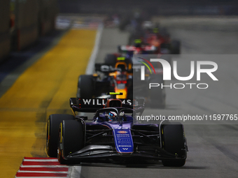 Franco Colapinto of Argentina drives the Williams Racing FW47 during the F1 Grand Prix of Singapore at Marina Bay Street Circuit in Singapor...