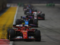 Carlos Sainz of Spain drives the Scuderia Ferrari SF-24 during the F1 Grand Prix of Singapore at Marina Bay Street Circuit in Singapore, Sin...