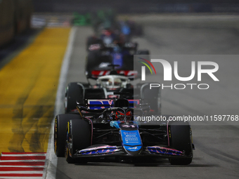 Esteban Ocon of France drives the BWT Alpine F1 Team A524 during the F1 Grand Prix of Singapore at Marina Bay Street Circuit in Singapore, S...