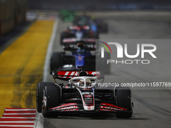 Kevin Magnussen of Denmark drives the MoneyGram Haas F1 Team VF-24 during the F1 Grand Prix of Singapore at Marina Bay Street Circuit in Sin...