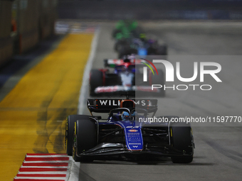 Alex Albon of Thailand drives the Williams Racing FW46 during the F1 Grand Prix of Singapore at Marina Bay Street Circuit in Singapore, Sing...