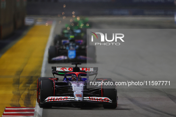 Daniel Ricciardo of Australia drives the Visa Cash App RB F1 Team VCARB 01 during the F1 Grand Prix of Singapore at Marina Bay Street Circui...