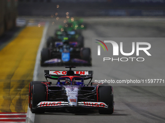 Daniel Ricciardo of Australia drives the Visa Cash App RB F1 Team VCARB 01 during the F1 Grand Prix of Singapore at Marina Bay Street Circui...