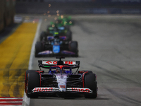 Daniel Ricciardo of Australia drives the Visa Cash App RB F1 Team VCARB 01 during the F1 Grand Prix of Singapore at Marina Bay Street Circui...