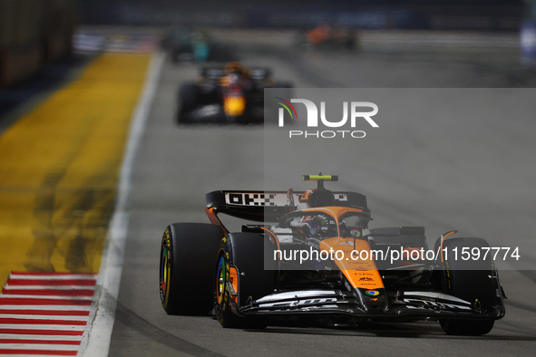 Lando Norris of the United Kingdom drives the McLaren Formula 1 Team MCL38 during the F1 Grand Prix of Singapore at Marina Bay Street Circui...