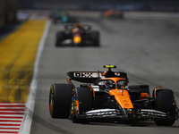 Lando Norris of the United Kingdom drives the McLaren Formula 1 Team MCL38 during the F1 Grand Prix of Singapore at Marina Bay Street Circui...