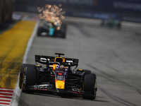 Max Verstappen of the Netherlands drives the Red Bull Racing-Honda RBPT RB20 during the F1 Grand Prix of Singapore at Marina Bay Street Circ...