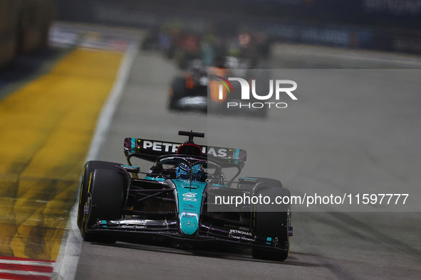 George Russell of the United Kingdom drives the Mercedes-AMG Petronas F1 Team F1 W15 during the F1 Grand Prix of Singapore at Marina Bay Str...