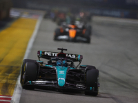 George Russell of the United Kingdom drives the Mercedes-AMG Petronas F1 Team F1 W15 during the F1 Grand Prix of Singapore at Marina Bay Str...