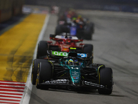 Fernando Alonso of Spain drives the Aston Martin Aramco F1 Team AMR24 during the F1 Grand Prix of Singapore at Marina Bay Street Circuit in...