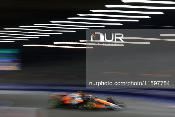 Lando Norris of the United Kingdom drives the McLaren Formula 1 Team MCL38 during the F1 Grand Prix of Singapore at Marina Bay Street Circui...