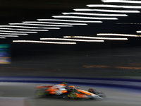 Lando Norris of the United Kingdom drives the McLaren Formula 1 Team MCL38 during the F1 Grand Prix of Singapore at Marina Bay Street Circui...