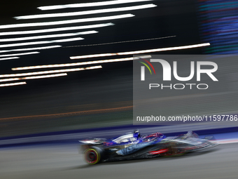 Daniel Ricciardo of Australia drives the Visa Cash App RB F1 Team VCARB 01 during the F1 Grand Prix of Singapore at Marina Bay Street Circui...