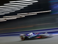 Daniel Ricciardo of Australia drives the Visa Cash App RB F1 Team VCARB 01 during the F1 Grand Prix of Singapore at Marina Bay Street Circui...