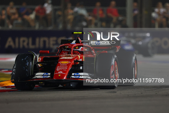 Carlos Sainz of Spain drives the Scuderia Ferrari SF-24 during the F1 Grand Prix of Singapore at Marina Bay Street Circuit in Singapore, Sin...