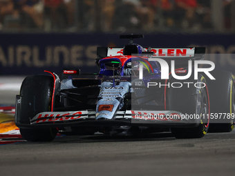 Daniel Ricciardo of Australia drives the Visa Cash App RB F1 Team VCARB 01 during the F1 Grand Prix of Singapore at Marina Bay Street Circui...