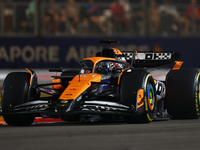 Oscar Piastri of Australia drives the McLaren Formula 1 Team MCL39 during the F1 Grand Prix of Singapore at Marina Bay Street Circuit in Sin...