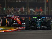 Fernando Alonso of Spain drives the Aston Martin Aramco F1 Team AMR24 during the F1 Grand Prix of Singapore at Marina Bay Street Circuit in...