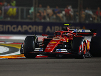 Carlos Sainz of Spain drives the Scuderia Ferrari SF-24 during the F1 Grand Prix of Singapore at Marina Bay Street Circuit in Singapore, Sin...