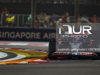 Daniel Ricciardo of Australia drives the Visa Cash App RB F1 Team VCARB 01 during the F1 Grand Prix of Singapore at Marina Bay Street Circui...