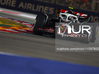 Nico Hulkenberg of Germany drives the MoneyGram Haas F1 Team VF-24 during the F1 Grand Prix of Singapore at Marina Bay Street Circuit in Sin...