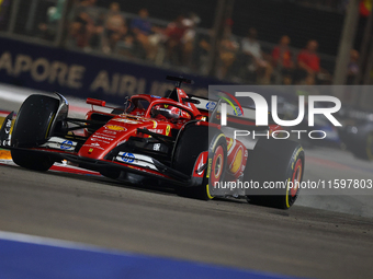 Charles Leclerc of Monaco drives the Scuderia Ferrari SF-24 during the F1 Grand Prix of Singapore at Marina Bay Street Circuit in Singapore,...