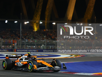 Lando Norris of the United Kingdom drives the McLaren Formula 1 Team MCL38 during the F1 Grand Prix of Singapore at Marina Bay Street Circui...