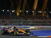 Lando Norris of the United Kingdom drives the McLaren Formula 1 Team MCL38 during the F1 Grand Prix of Singapore at Marina Bay Street Circui...