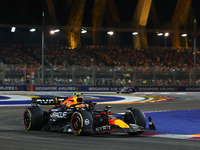 Sergio Perez of Mexico drives the Red Bull Racing-Honda RBPT RB20 during the F1 Grand Prix of Singapore at Marina Bay Street Circuit in Sing...