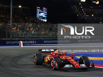 Carlos Sainz of Spain drives the Scuderia Ferrari SF-24 during the F1 Grand Prix of Singapore at Marina Bay Street Circuit in Singapore, Sin...