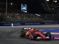 Carlos Sainz of Spain drives the Scuderia Ferrari SF-24 during the F1 Grand Prix of Singapore at Marina Bay Street Circuit in Singapore, Sin...