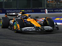 Lando Norris of the United Kingdom drives the McLaren Formula 1 Team MCL38 during the F1 Grand Prix of Singapore at Marina Bay Street Circui...