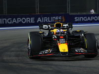 Max Verstappen of the Netherlands drives the Red Bull Racing-Honda RBPT RB20 during the F1 Grand Prix of Singapore at Marina Bay Street Circ...