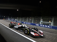 Nico Hulkenberg of Germany drives the MoneyGram Haas F1 Team VF-24 during the F1 Grand Prix of Singapore at Marina Bay Street Circuit in Sin...