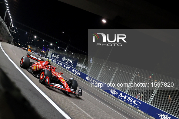 Carlos Sainz of Spain drives the Scuderia Ferrari SF-24 during the F1 Grand Prix of Singapore at Marina Bay Street Circuit in Singapore, Sin...