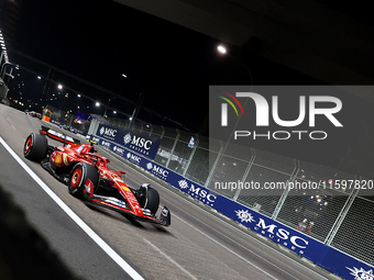 Carlos Sainz of Spain drives the Scuderia Ferrari SF-24 during the F1 Grand Prix of Singapore at Marina Bay Street Circuit in Singapore, Sin...