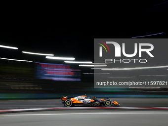 Lando Norris of the United Kingdom drives the McLaren Formula 1 Team MCL38 during the F1 Grand Prix of Singapore at Marina Bay Street Circui...